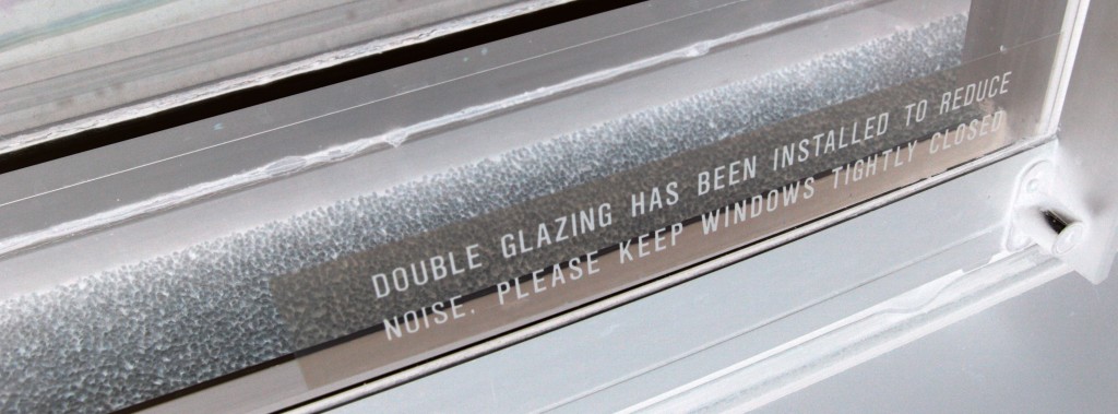 "Double glazing has been installed to reduce noise. Please keep window tightly closed."